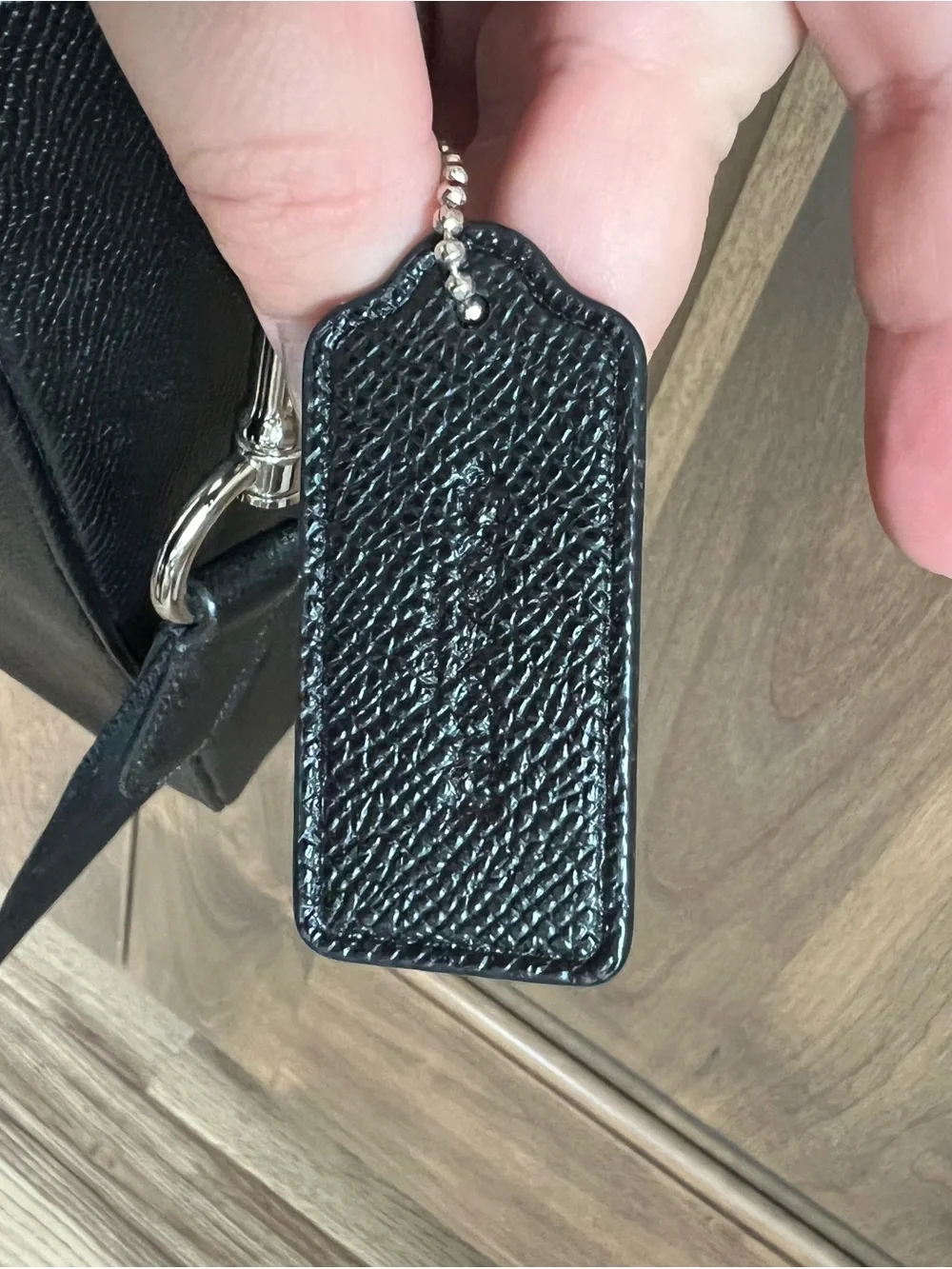 Coach sleek black